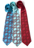 Crimson ink on turquoise, aqua, crimson. Standard width silk.