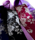Taupe ink on black, raspberry, microfiber array.