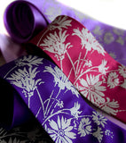Taupe ink on deep purple, raspberry, microfiber array.