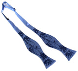 Blue-violet ink on a blue aster bow tie.