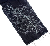 Ice blue ink on navy silk scarf.