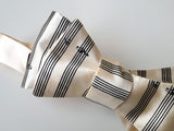 Sheet music bow tie: Black on cream.