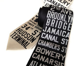 New York City Subway Sign Necktie. Ivory-cream on black; black on cream.