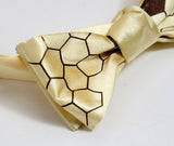  Chocolate brown ink on a butter bow tie.