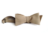 Handmade tan perforated leather bow tie