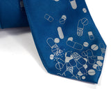 Blue Pill necktie. Dove gray print on french blue.