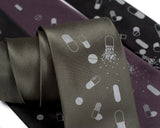Chill Pill neckties: Dove gray print on olive, charcoal, black microfiber.
