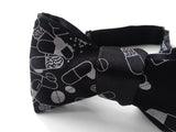 Pills bow tie: silver on black.