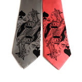 Black ink on silver, red.