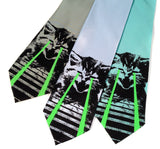 Laser Cat ties. Black and glow green on seafoam, sky blue, aqua.