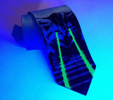 Laser Cat tie: glow green on aqua, under blacklight.