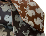 Dove gray ink on black, dark brown microfiber.