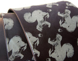 Dove gray ink on black microfiber.