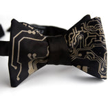 black and gold circuit board bow tie