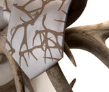 Silk Antler print necktie. Tan on cream