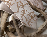 Antler print silk necktie. Tan on cream