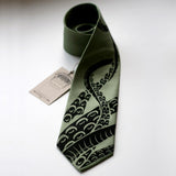 Sgae green octopus tentacle necktie.