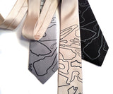 Race Track Map Camo Necktie, by Cyberoptix. Black pearl print on silver, champagne, black.