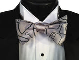 Black pearl ink on a silver bow tie.