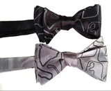  Black pearl ink on a black, silver bow tie.