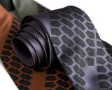 Tire Tread Necktie. Black on charcoal, cinnamon, olive.