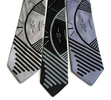 TV Test Pattern tie: black on silver; dove grey on black; black on steel.