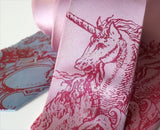 Berry ink on pink, sky blue.