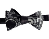 Dove gray ink on a black bow tie.