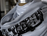 Black ink on silver pashmina.