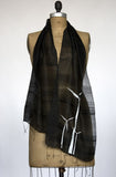  White ink on black silk scarf.